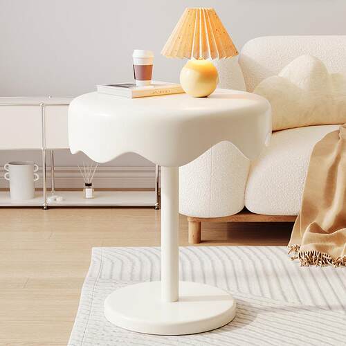 A minimalist and trendy cream-colored living room side table