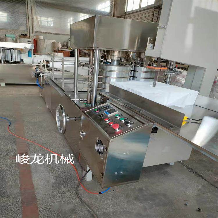 全自动趴单折叠机，一次性床单机，无纺布点断美容床单折叠机