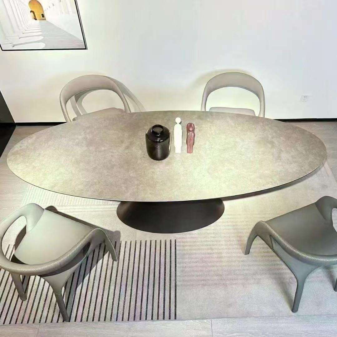 设计师飞碟餐桌意式极简椭圆桌子超晶石岩板饭桌大理石别墅豪华桌图片