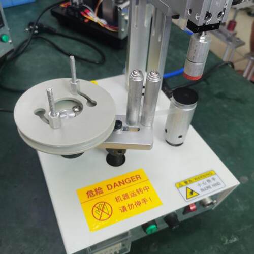 TM-1000S高低频变压器磁芯线包外围胶布半自动包膜机各种外围包胶