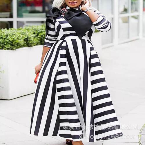 Large size long sleeved striped dress with a large