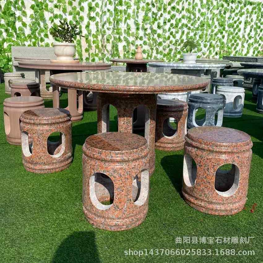 中国红石雕桌子别墅庭院花岗岩镂空圆桌休闲桌凳现货厂家优惠