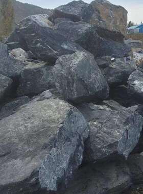 黑山石置石石蛋园林绿化原石厂家买卖景观河道景石造景黑色置石