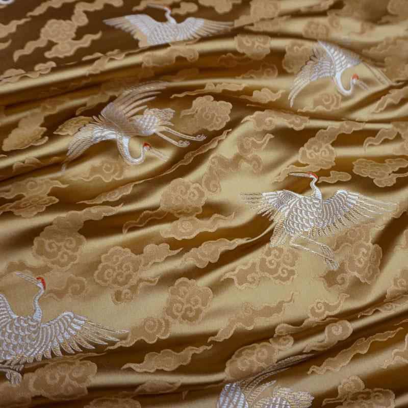 金棕黄色祥云朵仙鹤织锦缎布料丝绸缎子面料云锦唐装汉服装饰