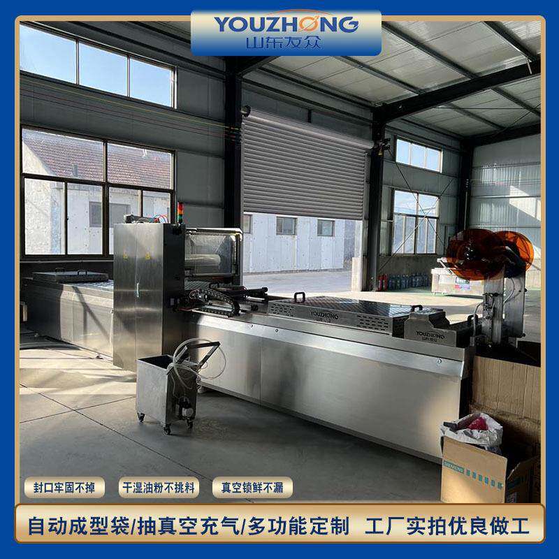 莲藕锁鲜拉伸膜包装机 卤蛋热封成型输送线 自动覆膜抽真空封口机