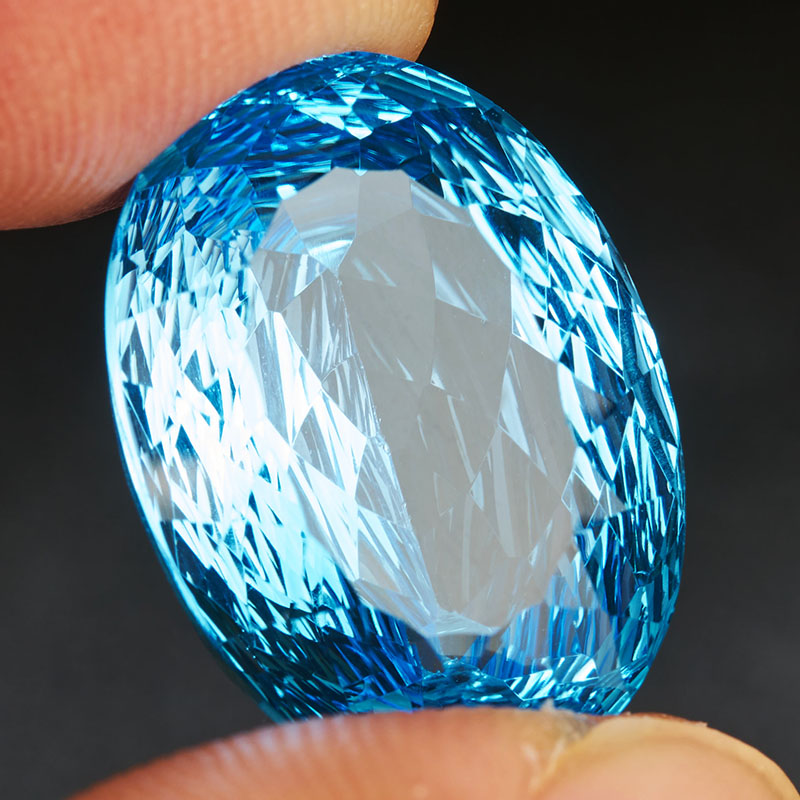 源头捡漏价 16.0克拉蓝色托帕石裸石戒面鸟巢切工 支持私人定制