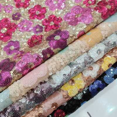 2025年新款全涤500米克时尚亮片绣面料时装服饰背景布常用纺织品