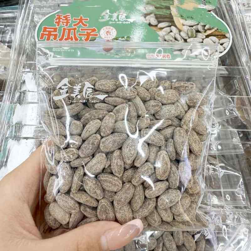 金美辰吊瓜子野瓜篓子奶油味开口松子野黑松手剥松子炒货年货零食