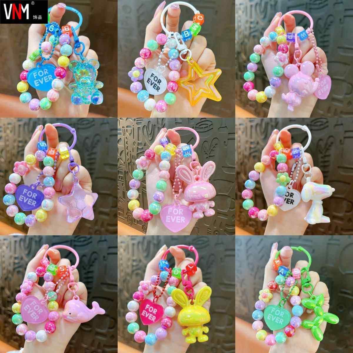 亚克力电镀海洋海豚钥匙扣挂件清新彩色串珠情侣包包挂饰礼品