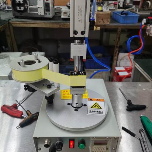 TM-1000RS变压器外围胶带半自动包胶机带气缸压料食品盒子打包机
