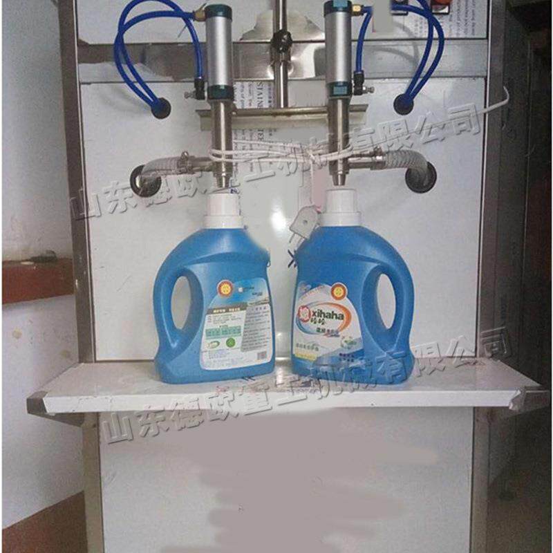 半自动灌装机 自流体定量灌装设备 蜂蜜膏体立式双头气装瓶机