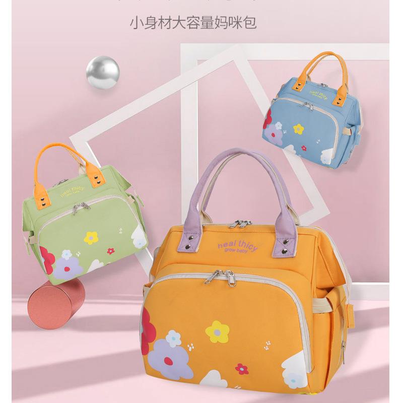 新款时尚便携轻便宝妈包旅行收纳包多用途妈咪包单肩手提母婴包