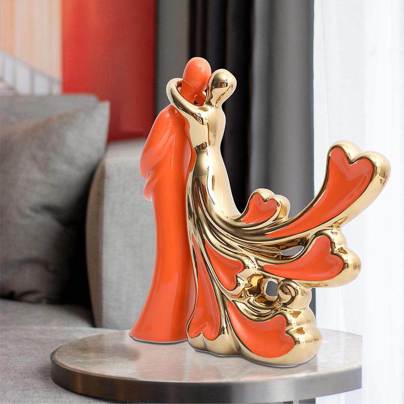 现代简约陶瓷橙金情侣人物客厅家居摆件电视酒柜办公室装饰工艺品