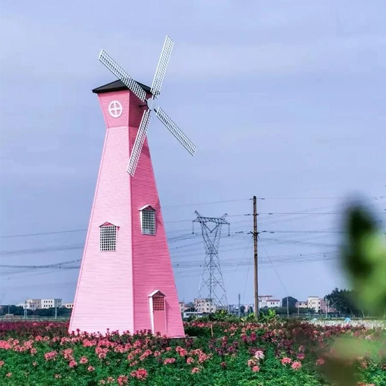 山东无穷大景观制作锕大型白色木质巨型室外金属转动七彩落地风车