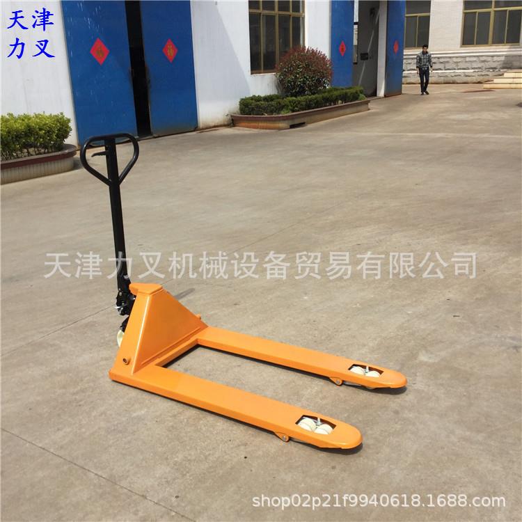天津低放型托盘车手动液压搬运车35MM手推叉车油压升高地老虎
