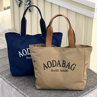 新款韩版网红多巴胺撞色字母大容量手提袋妈咪包上班通勤手拎包女