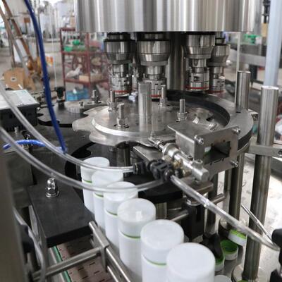 厂家供应6000瓶每小时8头塑料瓶螺纹盖压盖机