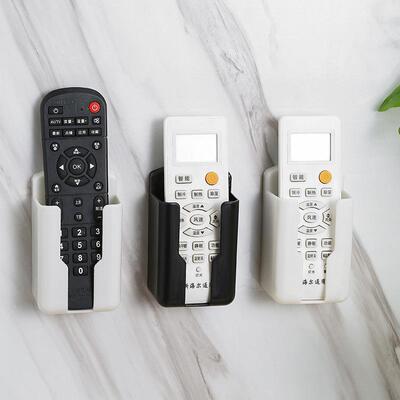 Wall-mounted bracket for storing air conditioner and TV remo