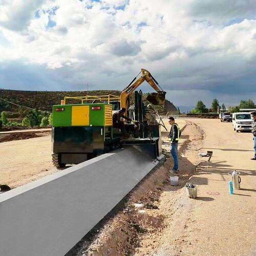 混凝土肩石滑模机厂家排型沟防撞墙路滑模水成型机714路边沟成机