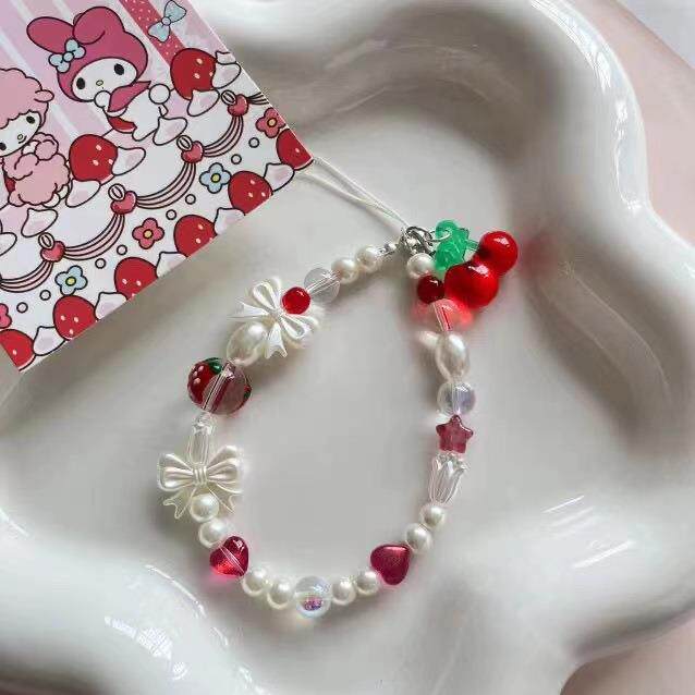 ins花朵链条草莓蝴蝶结手机挂链小众串珠樱桃吊坠相机ccd挂绳短款