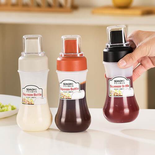 Squeeze bottle for tomato salad dressing with a plastic nozz