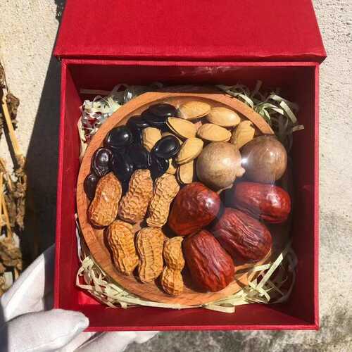 厂家批发 红木年货花生瓜子大红枣果盘崖柏小叶黄杨木制工艺品