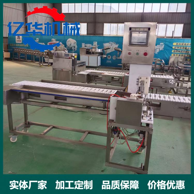 鱿鱼串穿串机新型腊肠自动上签设备多功能香肠串穿串机生产