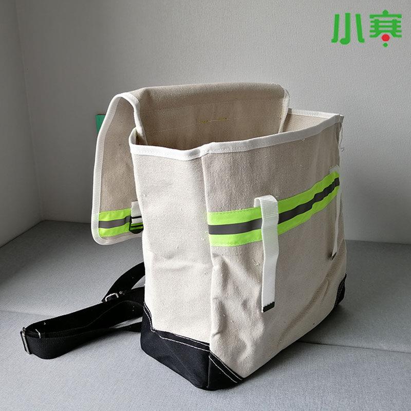 小寒双肩电工包加厚帆布多功能五金双肩包工具包耐磨维修包白色