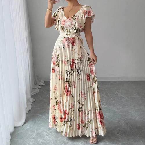 A women's apricot colored fashionable rose print pleated
