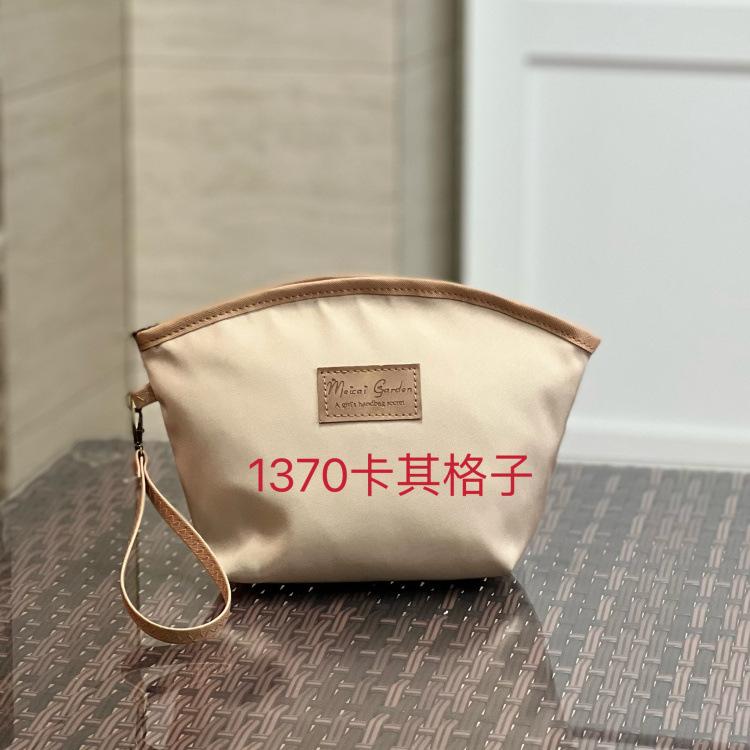 化妆包女便携式口红小杂物收纳包轻奢高级2026旅行小型零钱包