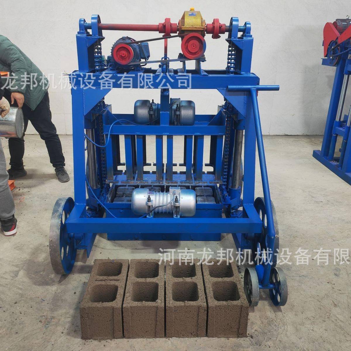 大轮移动砖机下蛋圆孔空心砌块成型机实心成型水泥免烧砖机设备