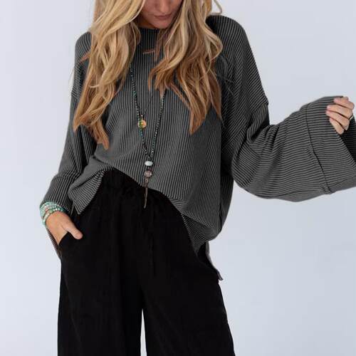 Hollow out twisted long sleeved T-shirt top with a sense