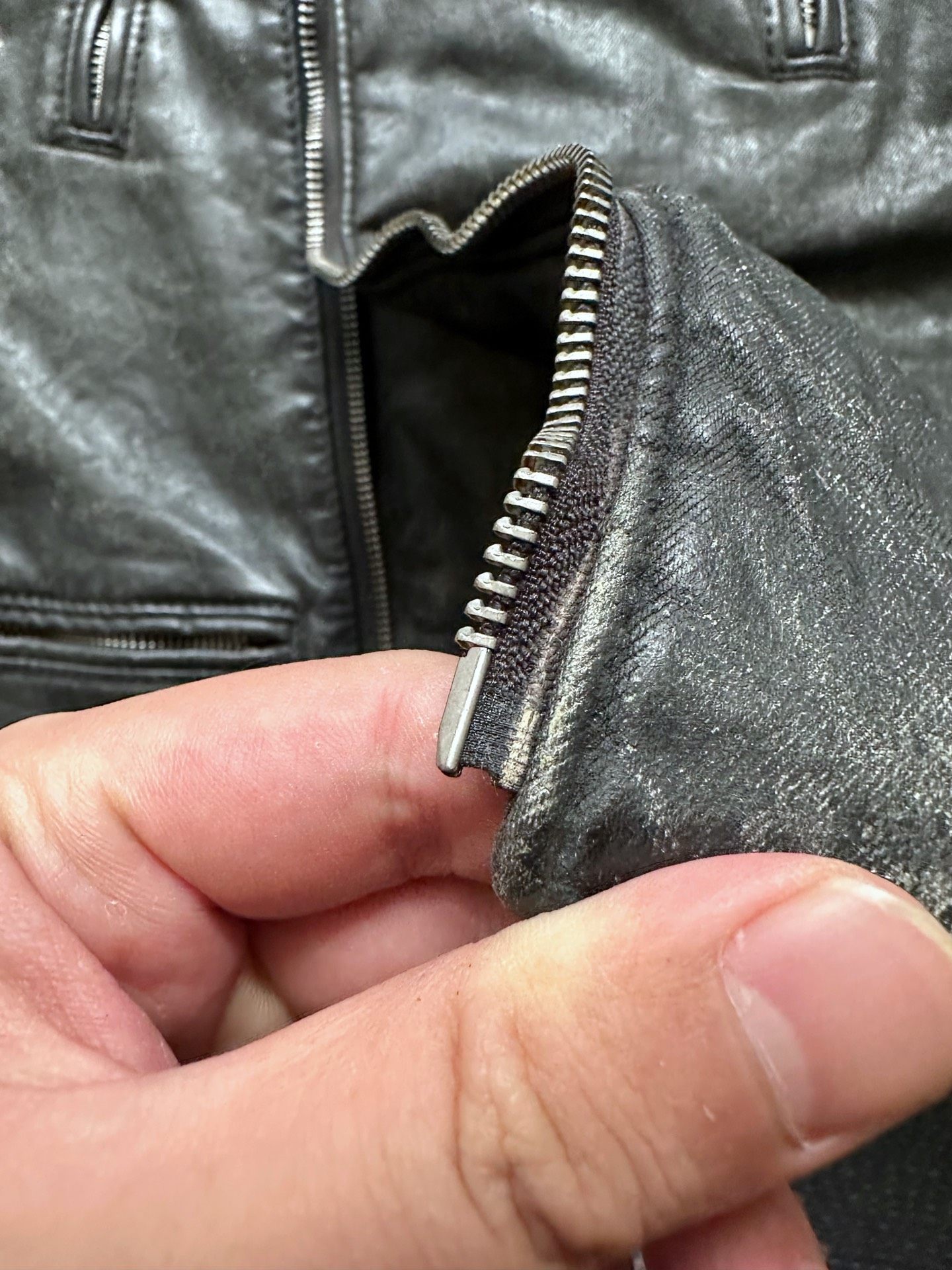 Black Coated Diagonal Zip Motorcycle Jacket — label