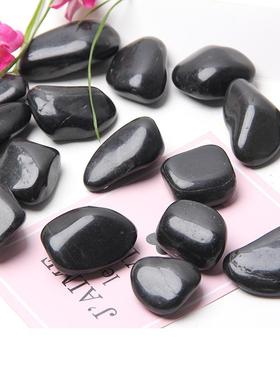 黑色抛光鹅卵石天林厂家铺路园EOY雨花然黑色装饰造石景石头