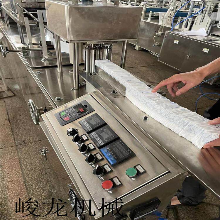 厂家优惠一次性毛巾机设备无纺布旅行便携压缩浴巾折叠机