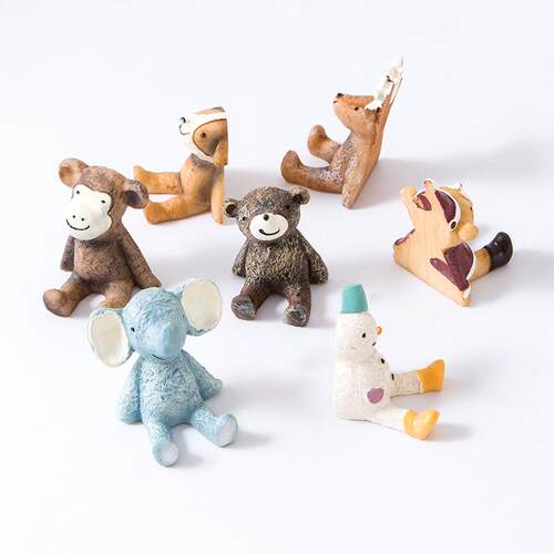 Animal-themed wall-mounted hooks for cafes, bars, and shops.