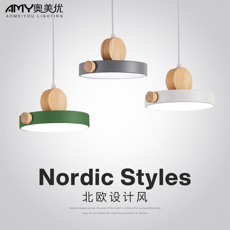 北欧饭厅吊灯三头现代简约网红饭厅吧台灯具马卡龙创意床头小吊灯