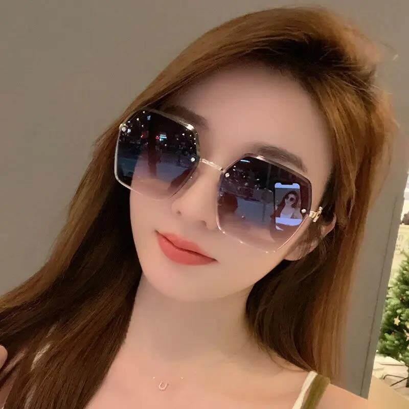 无边框女式太阳眼镜夏季高级感拍照防晒大脸显瘦开车专用太阳眼镜