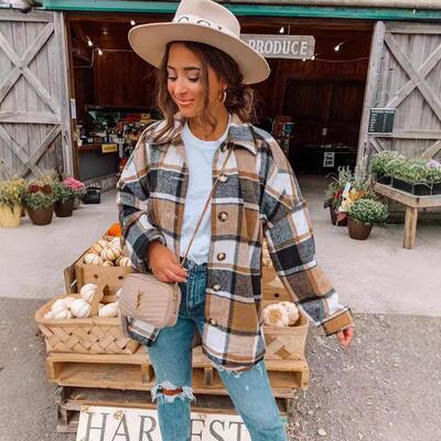 Long sleeved collared women's checkered shirt mid length