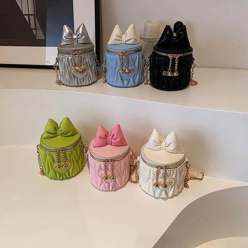 日本品质女童包包蝴蝶结水桶包洋派儿童可爱斜挎女孩公主零钱包