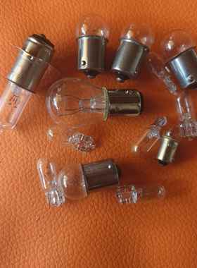 适用于本田鹰仔WIN100摩托车大灯泡12V35W三爪灯泡 6V25W三爪灯泡