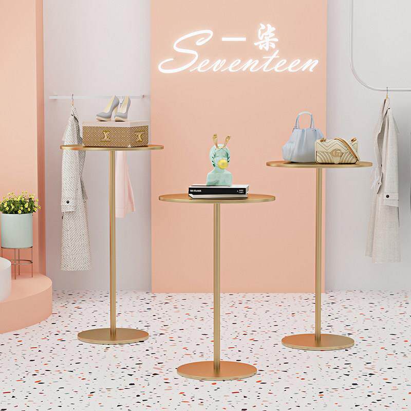 服装商店橱窗装饰道具圆形展示架金色落地桌高低架流动桌鞋袋架