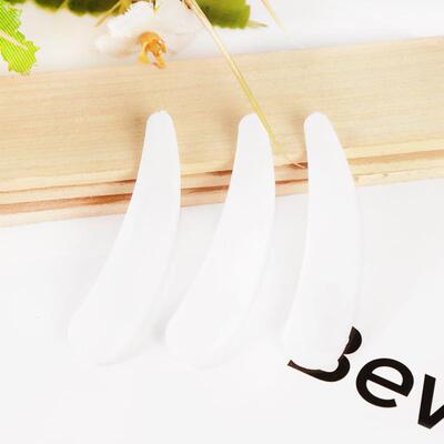 Small white spoon, small utensil spoon, small stirrer, dedic