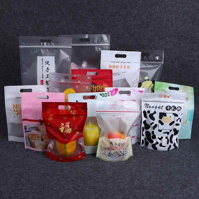 厂家直供自立开窗雪花酥牛轧糖礼品饼干复合膜手提自封袋 50个/件