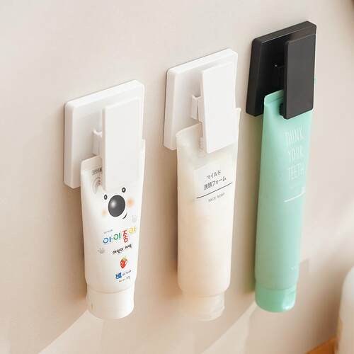 Wall-mounted facial cleanser and toothpaste holder for bathr