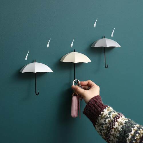 Wall-mounted umbrella hook and storage rack, creative design