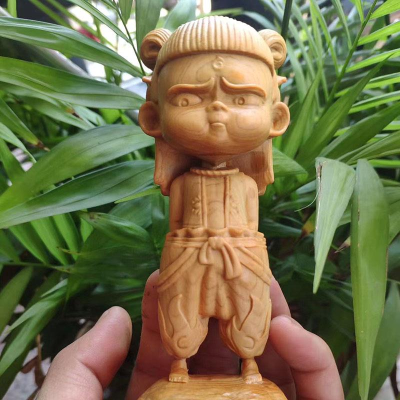 崖柏木雕魔童哪吒三太子淘气版人物工艺品车载摆件家居办公室摆设