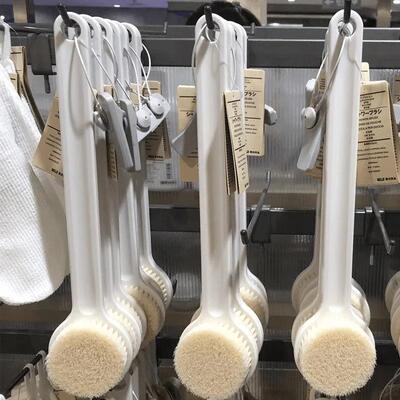 Long-handled bath brush for back scrubbing, a self-reliant b