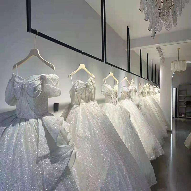 婚纱礼服展示架服装店上墙U型悬吊式天花板悬挂陈列衣架秀禾侧挂