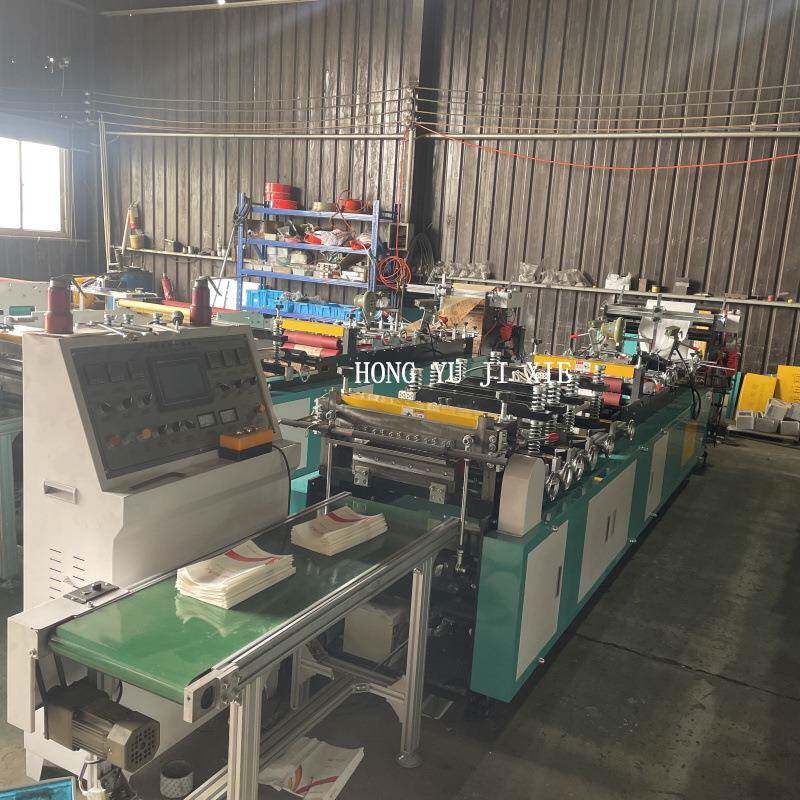 一次性航空清洁袋生产设备高铁垃圾纸袋制袋机淋膜纸袋机器